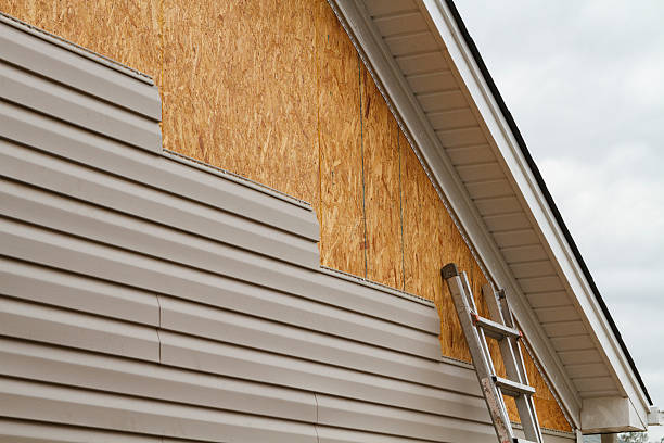 Professional Siding technician working in Highland Park, NJ
